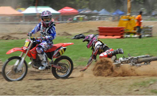 World of pain: The spills and stacks at the Coffs Harbour Stadium Motocross were as spectacular as some of the close race finishes. World of pain: The spills and stacks at the Coffs Harbour Stadium Motocross were as spectacular as some of the close race finishes.